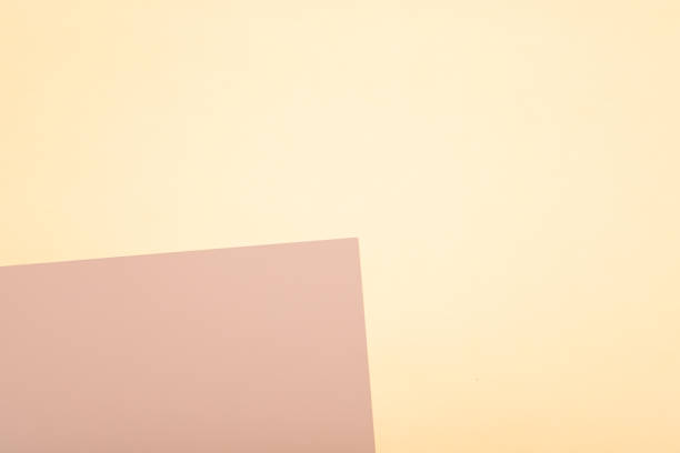 istock Beige and yellow paper minimal background 1209846215