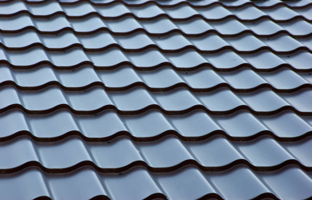 istock blue  metal tile roof, background 1209846874