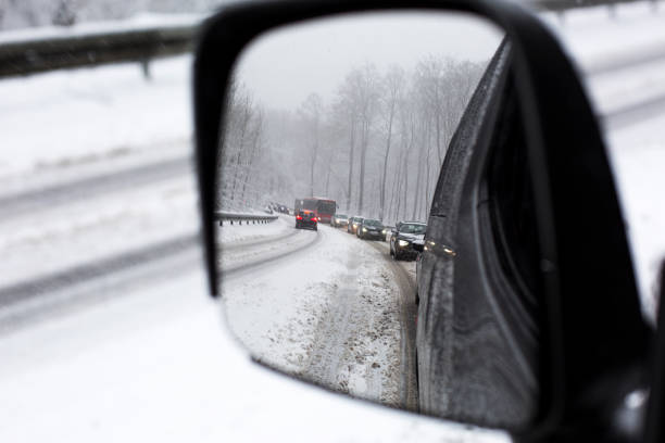 istock Bad road conditions during heavy snowfall 1209848304