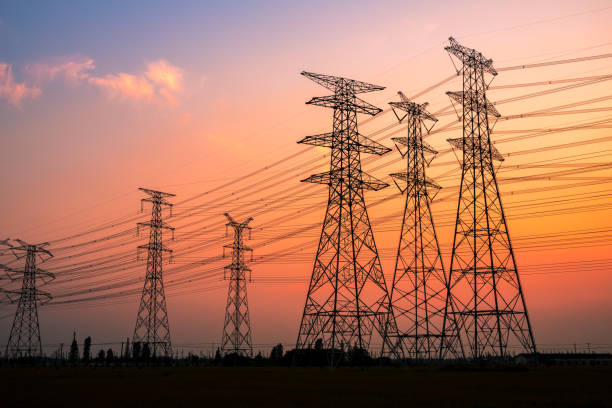istock High voltage power tower and nature landscape at sunset 1209850151