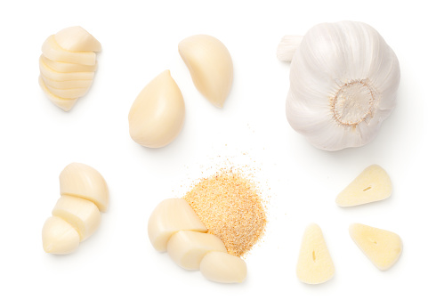 Set of garlic in various forms isolated on white background. Top view, flat lay