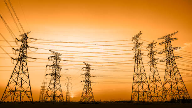 istock High voltage power tower and nature landscape at sunset 1209854809