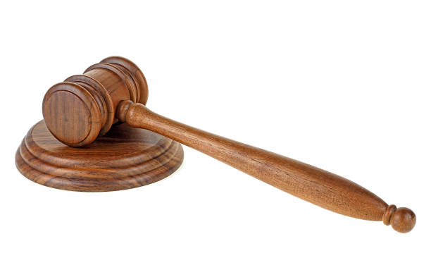 istock Wooden judge gavel isolated on a white background 1209855048