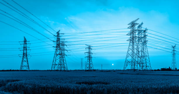 istock High voltage power tower and nature landscape at sunset 1209855093