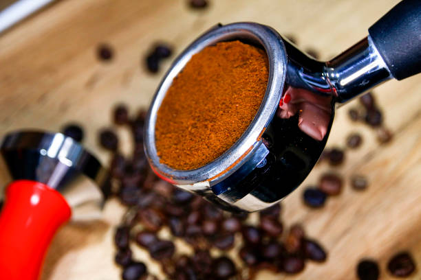 istock Filter holder for espresso coffee machine and coffee beans 1209855813