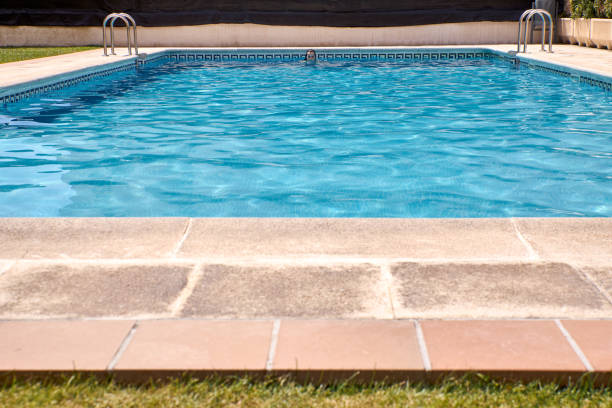 istock person swimming in the pool 1209858710