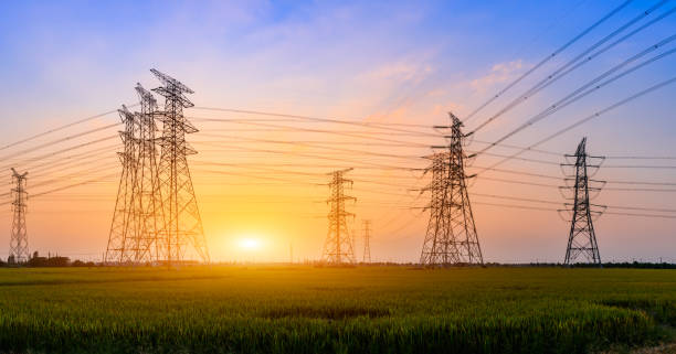 istock High voltage power tower and nature landscape at sunset 1209858811