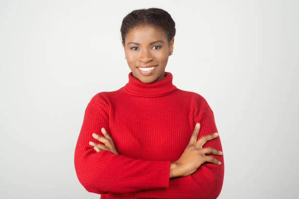 istock Confident young woman with crossed arms 1209859868