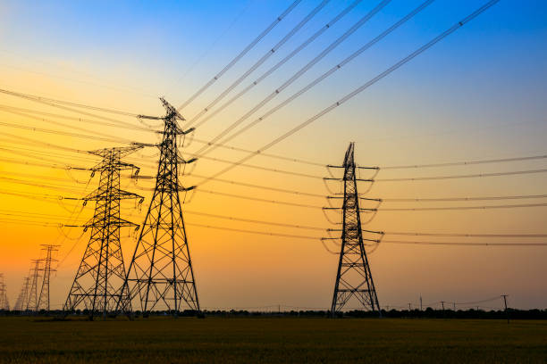 istock High voltage power tower and nature landscape at sunset 1209861195