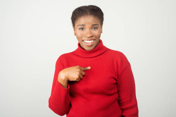 istock Smiling surprised woman looking at camera 1209861264