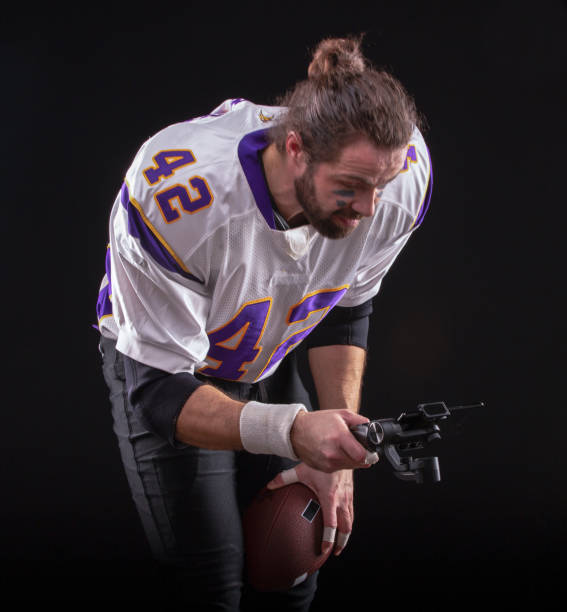 istock Footballer with smartfone on gimbal 1209861334