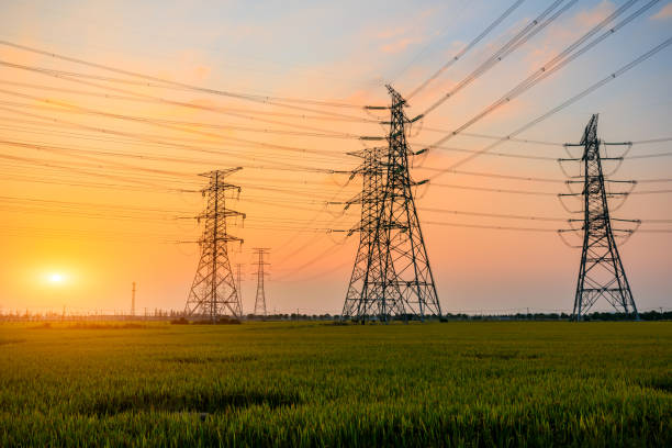 istock High voltage power tower and nature landscape at sunset 1209861522