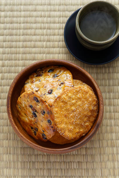 istock Japanese traditional confection rice crackers and hot japanese tea 1209863749