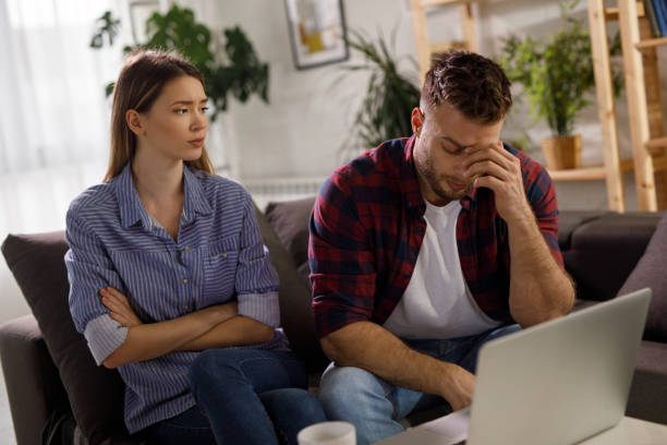 istock Young couple having an argument at home 1209864115