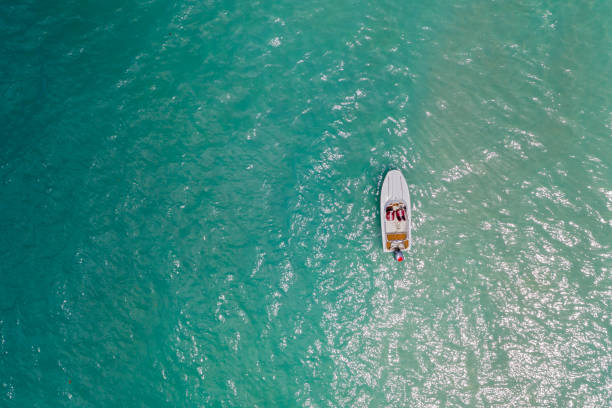 istock Small boat in the ocean 1209864334