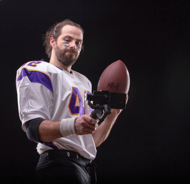 istock Footballer with smartfone on gimbal 1209865282