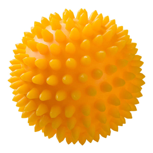 istock yellow rubber massage ball, for relaxation and for massage, on a white background 1209866774