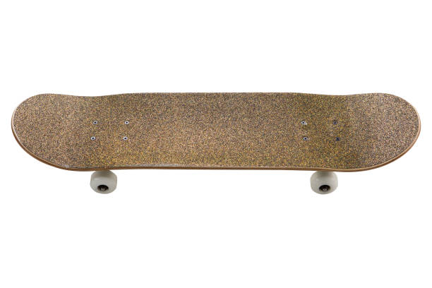 istock golden skateboard, with white wheels, frontal view, rough surface of the board, on a white background 1209866780