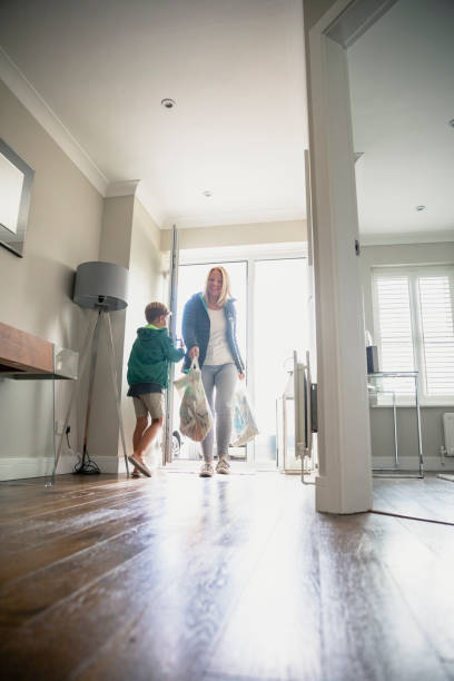 istock Holding Door For Mummy! 1209867727