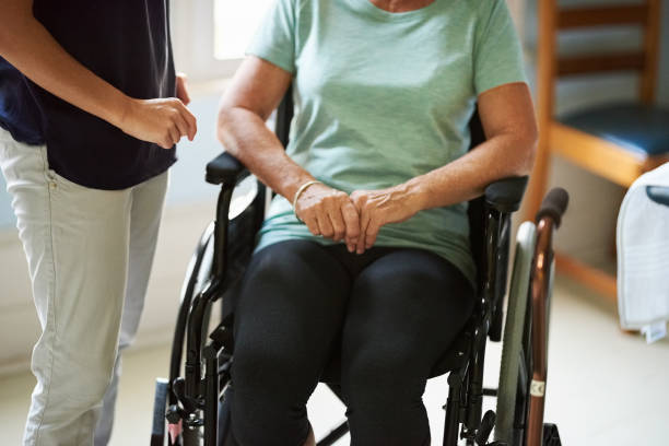 istock Feeling nervous to take the first step from the wheelchair 1209869871