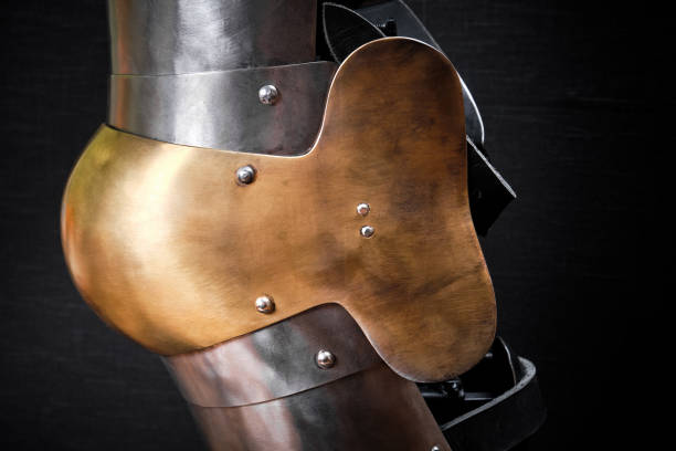 istock Knight armor for knees on a black. 1209872170