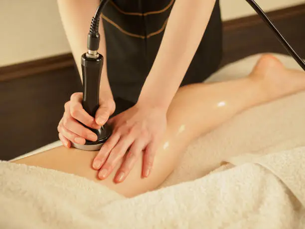 Japanese woman receiving hyper knife treatment at beauty salon