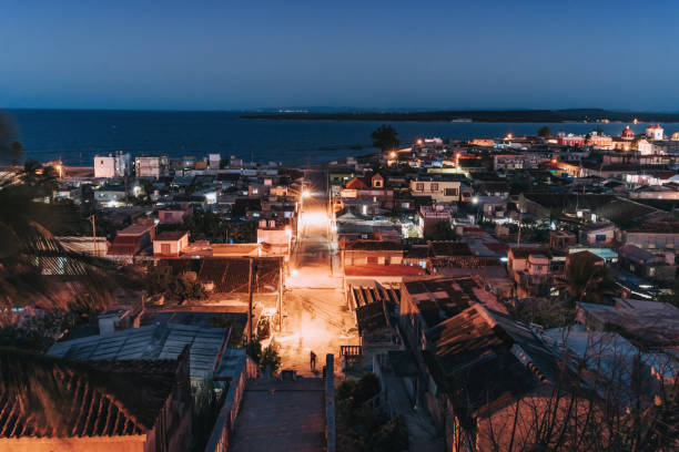 istock night view over Gibara in Cuba with blue ocean in background 1209872358