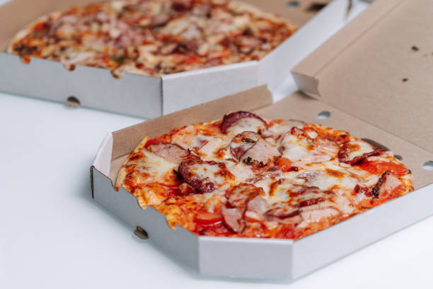 istock Fresh made pizza in Italian restaurant. 1209872574