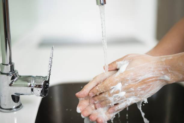 concept washing hands with soap stock photo