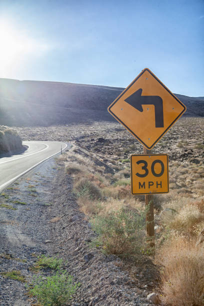 istock Left turn along the road through the Death valley National Park 1209875459