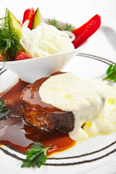 istock Pork neck confit with pickled vegetables 1209876734