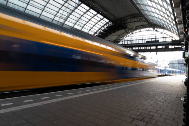 istock Train arriving in Amsterdam Central station 1209877932