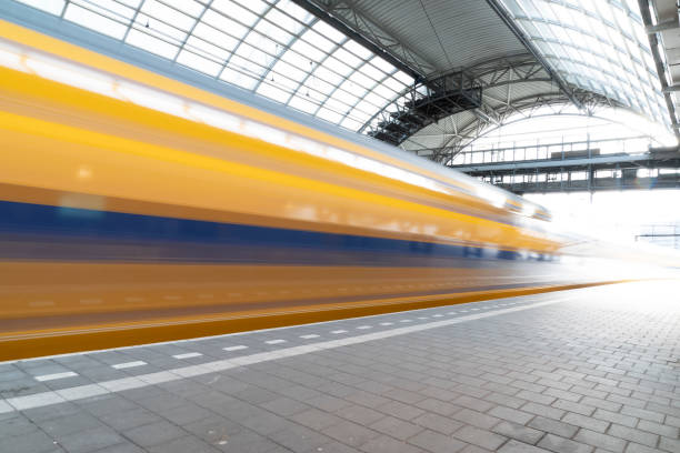 istock Train arriving in Amsterdam Central station 1209877988
