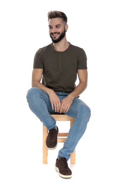 istock Cheerful casual man laughing while sitting 1209879834