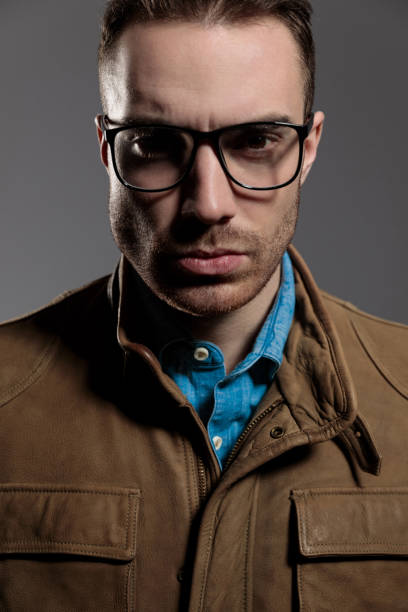 istock Confident fashion model looking forward while wearing glasses 1209882163