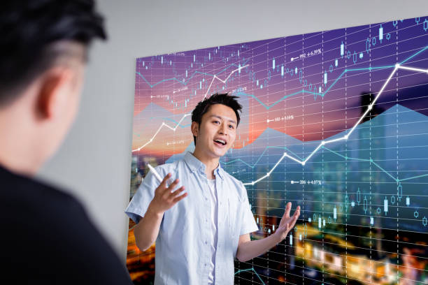 Businessman giving presentation on future plans to colleagues