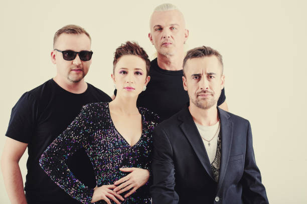 istock Group of music band members 1209885546