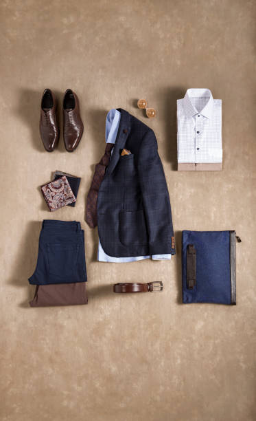istock Men’s clothing with personal accessories isolated on beige background 1209887571