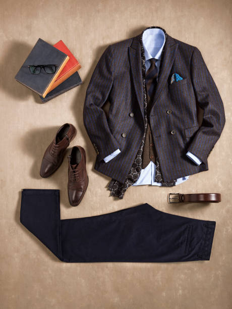 istock Men’s clothing with personal accessories isolated on beige background 1209887622