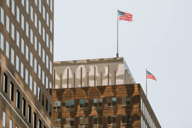 istock Manhattan skyscraper with USA flag 1209888095