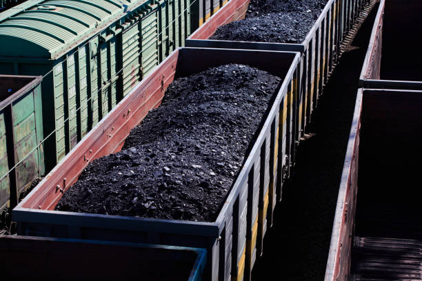 istock Fraight green wagons full of coal. 1209889356