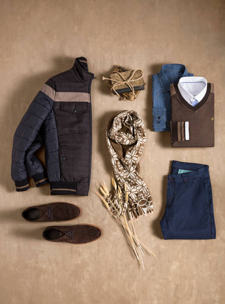 istock Men’s clothing with personal accessories isolated on beige background 1209889414
