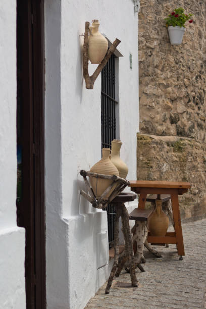 Facade decorated with pitchers in Vejer de la Frontera, Spain