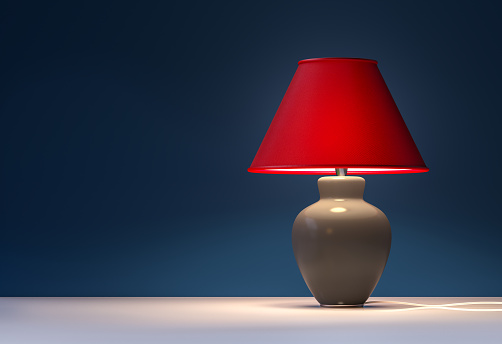Red lamp on blue background - interior - 3d rendering