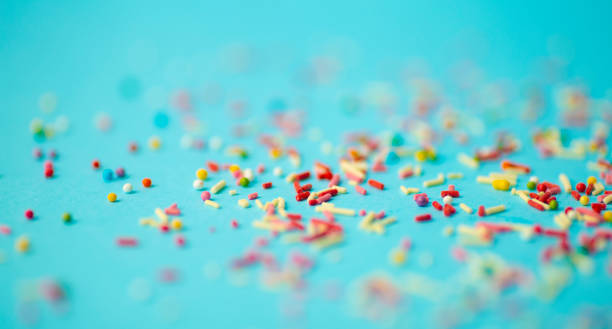 istock Sugar topping with bokeh effect. Festive background concept 1209891937