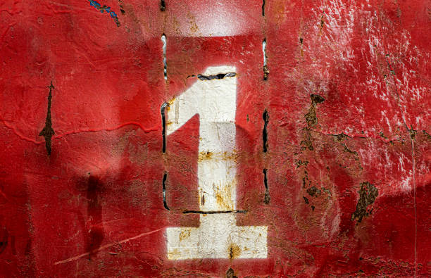 istock Numbers on an old rusty metal background. Texture of old paint and rust on the numbers 1209892003