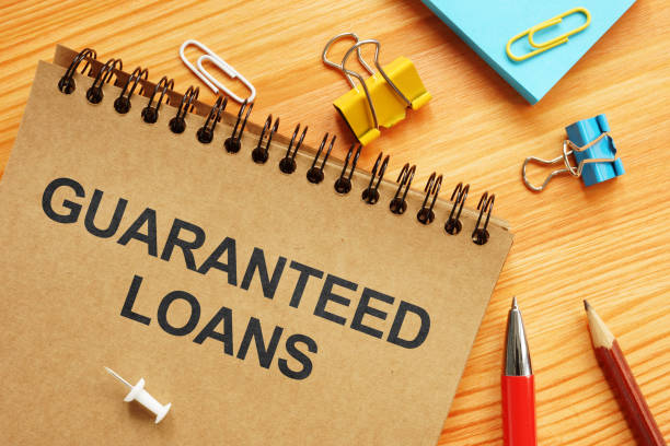 istock Conceptual photo showing printed text guaranteed loans 1209892004