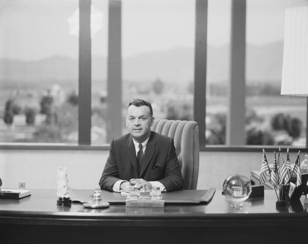 Mature businessman in office, smiling, portrait  1968 stock pictures, royalty-free photos & images