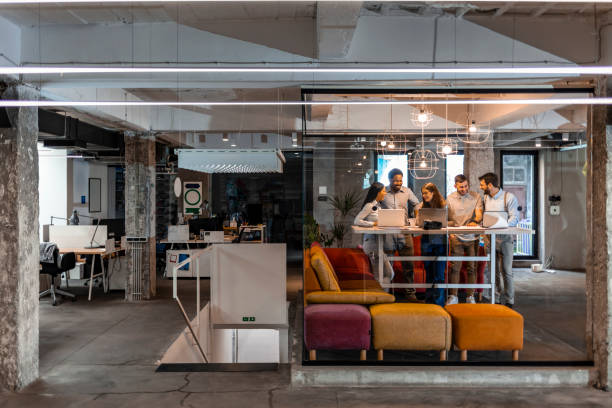 istock Multi ethnic diverse group of creative team or business coworker working in office. 1209893099