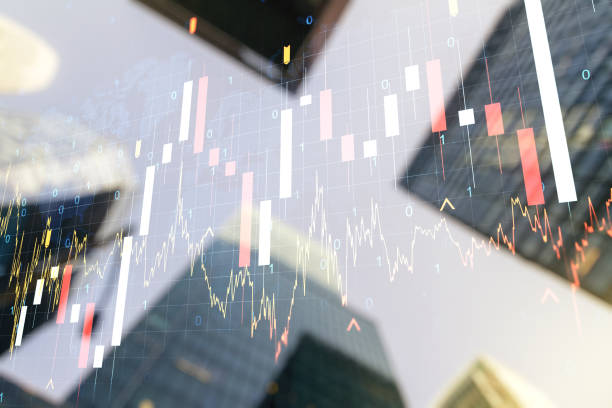 istock Double exposure of abstract financial graph with world map on office buildings background, financial and trading concept 1209893851